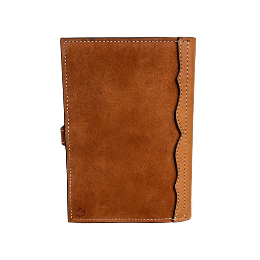 Bible cover rough out toast leather bel flower tooling with a #27 concho back view.