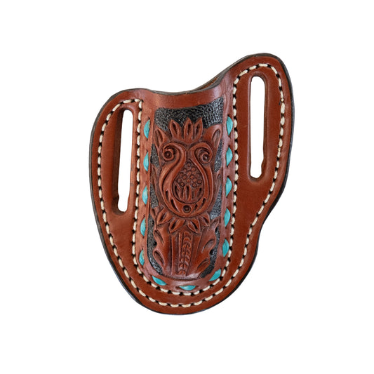 Pancake knife sheath toast leather AA tooling with teal buckstitch and black background paint.