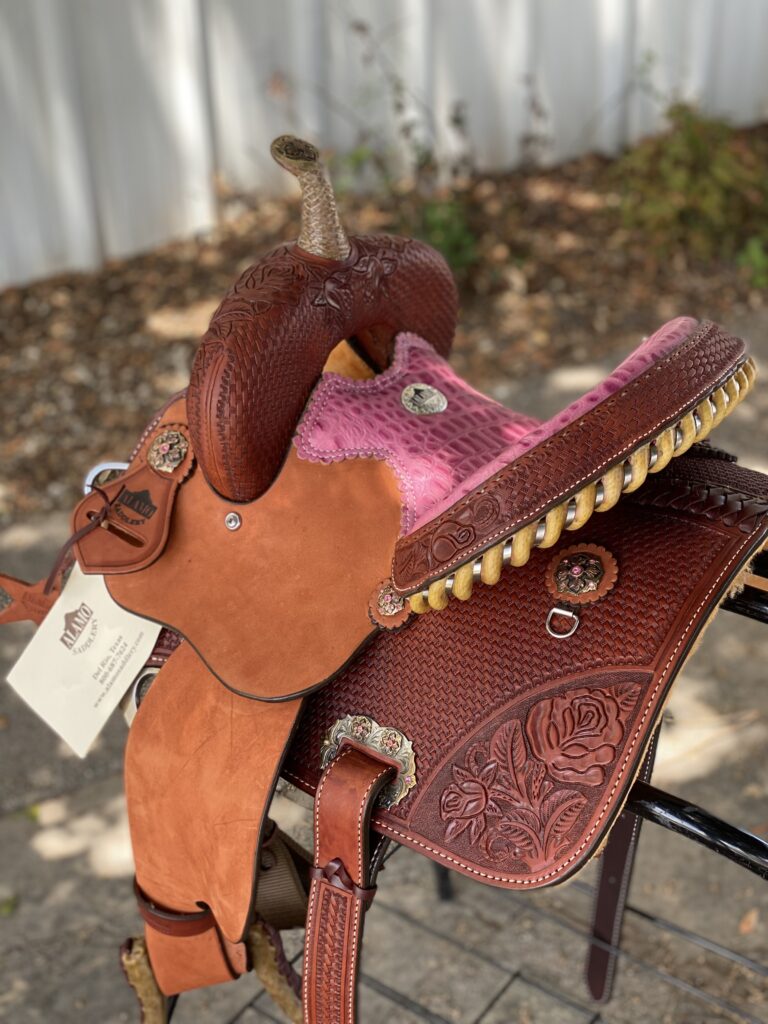 Youth rose barrel saddle back view.