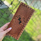 Tooled tally book with deer antlers and initials