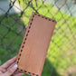 Tooled tally book with deer antlers and initials