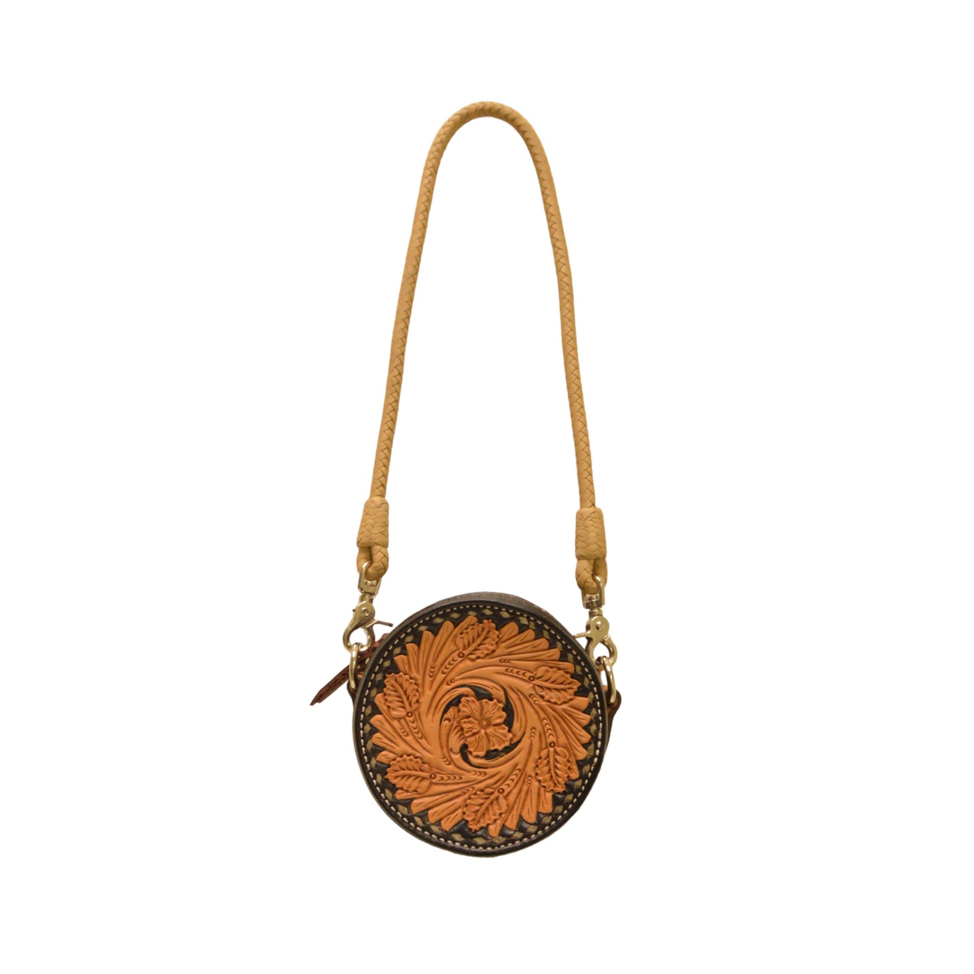 This is our stunning rope can handbag, perfect for any occasion. It's in our golden leather wild rose tooling with a braided strap, rawhide buckstitch, and black paint to the edge. Inside features our vintage metallic overlay with a cardholder. 