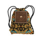Drawstring bag with rough out chocolate leather geo-aztec tooling with buckstitch