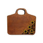 Traveling Cowboy golden leather sunflower tooling with brown background paint with an antique finish.